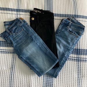 three pairs of 00 American Eagle Super stretch jeans